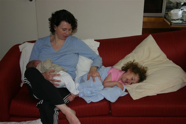 Mummy, Anna and Nate playing on sofa