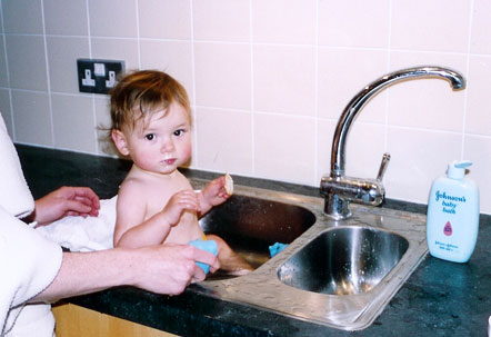 Anna in sink